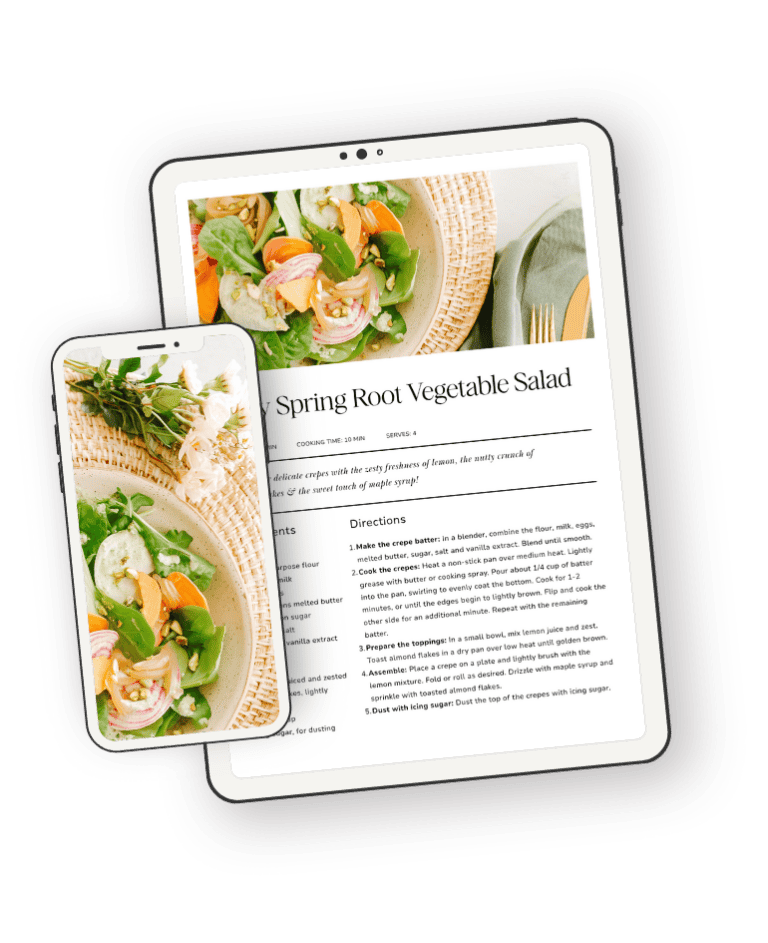 A tablet displays a recipe for Spring Root Vegetable Salad, showing text and a salad photo. A smartphone beside it shows a close-up of the same salad and some wooden utensils. Both devices are on a white surface.